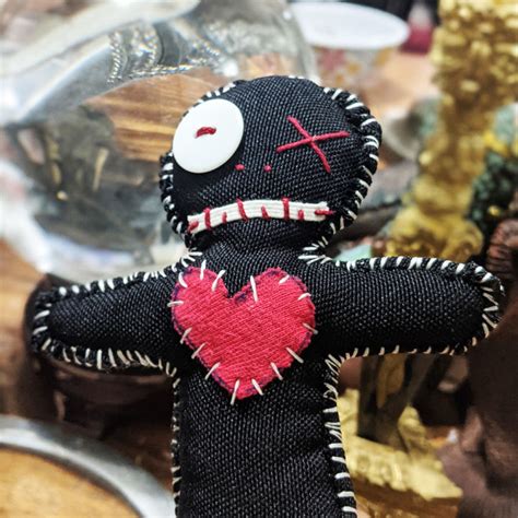 The Haunting Spirit Voodoo Doll: A Talisman for Protection and Curse